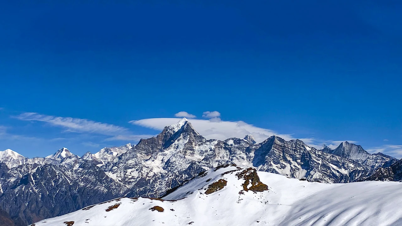 Snow-covered Incredible Himalayan Mountain Views with dramatic clouds