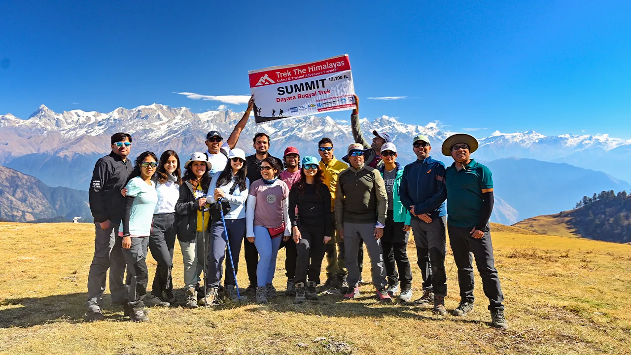 Dayara Bugyal Summit Point with the Trek The Himalayas banner