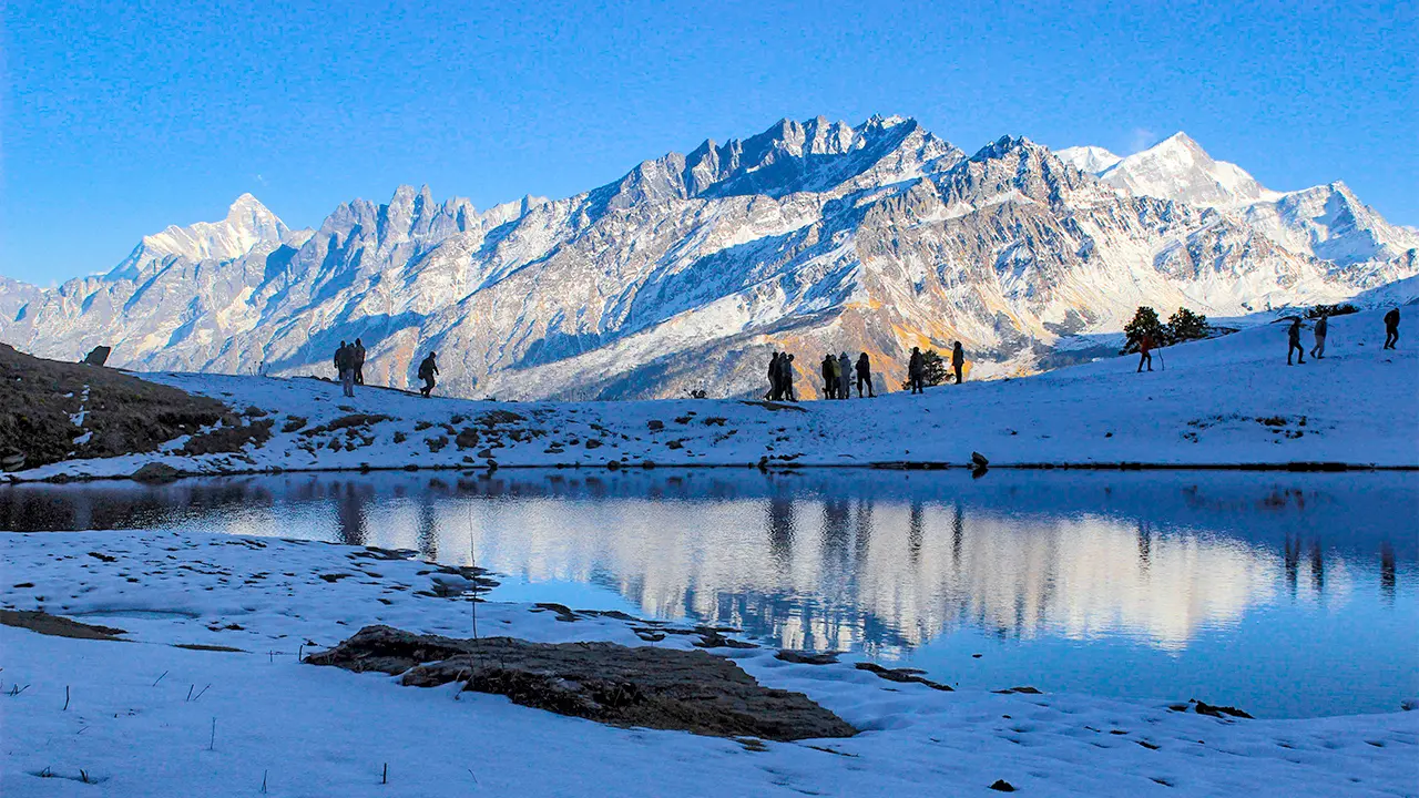 Beautiful snow-covered lake at Kuari Pass