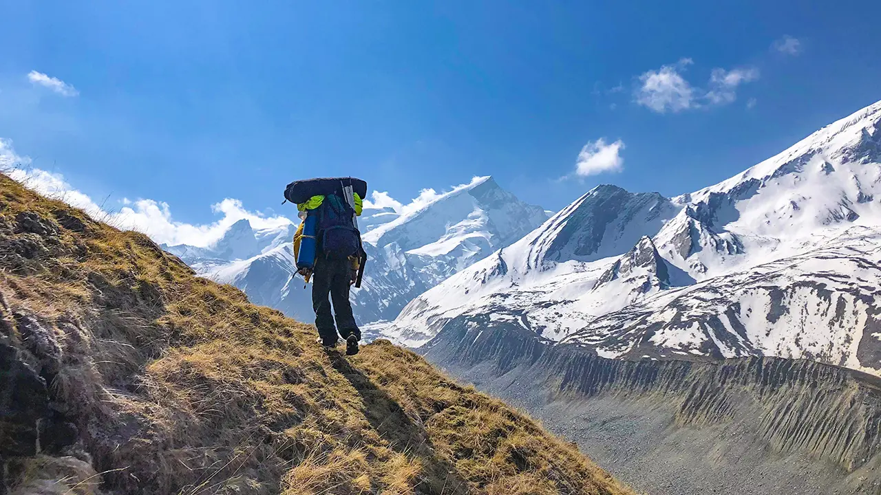 Climber acclimatizing on a mountain trail, Trek The Himalayas